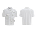 Men's grey polo shirt with a deconstructed multi-collar design and a geometric floral pattern on the front.