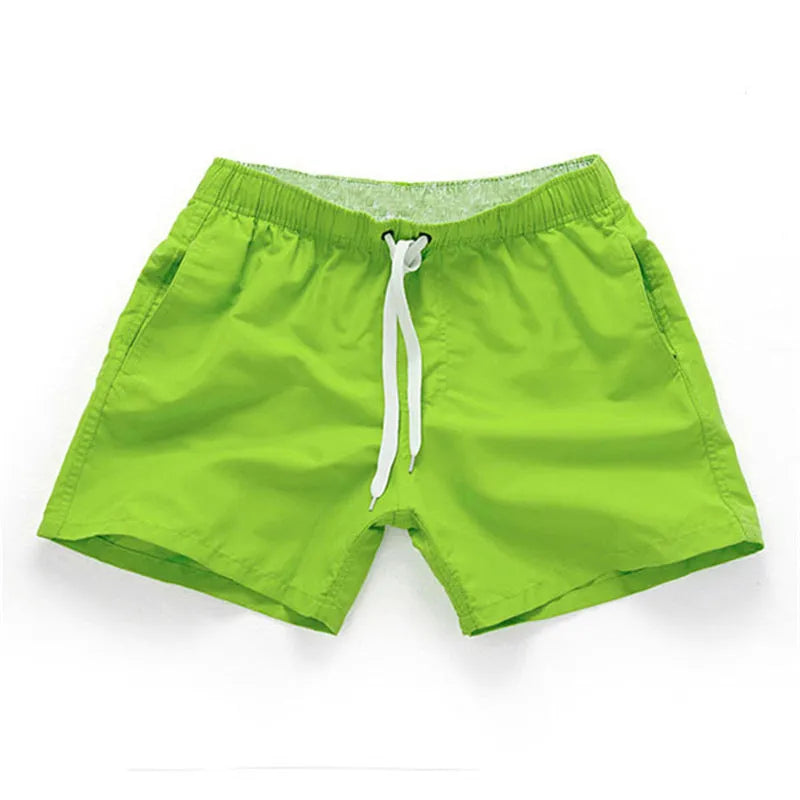 Men's polyester beach shorts in multiple colours with straight leg design for surfing and summer wear, available in sizes S to 4XL