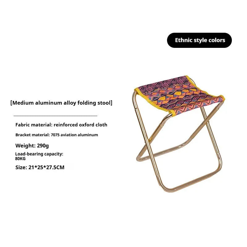 Black ethnic style aluminium alloy folding camp stool shown folded and unfolded.