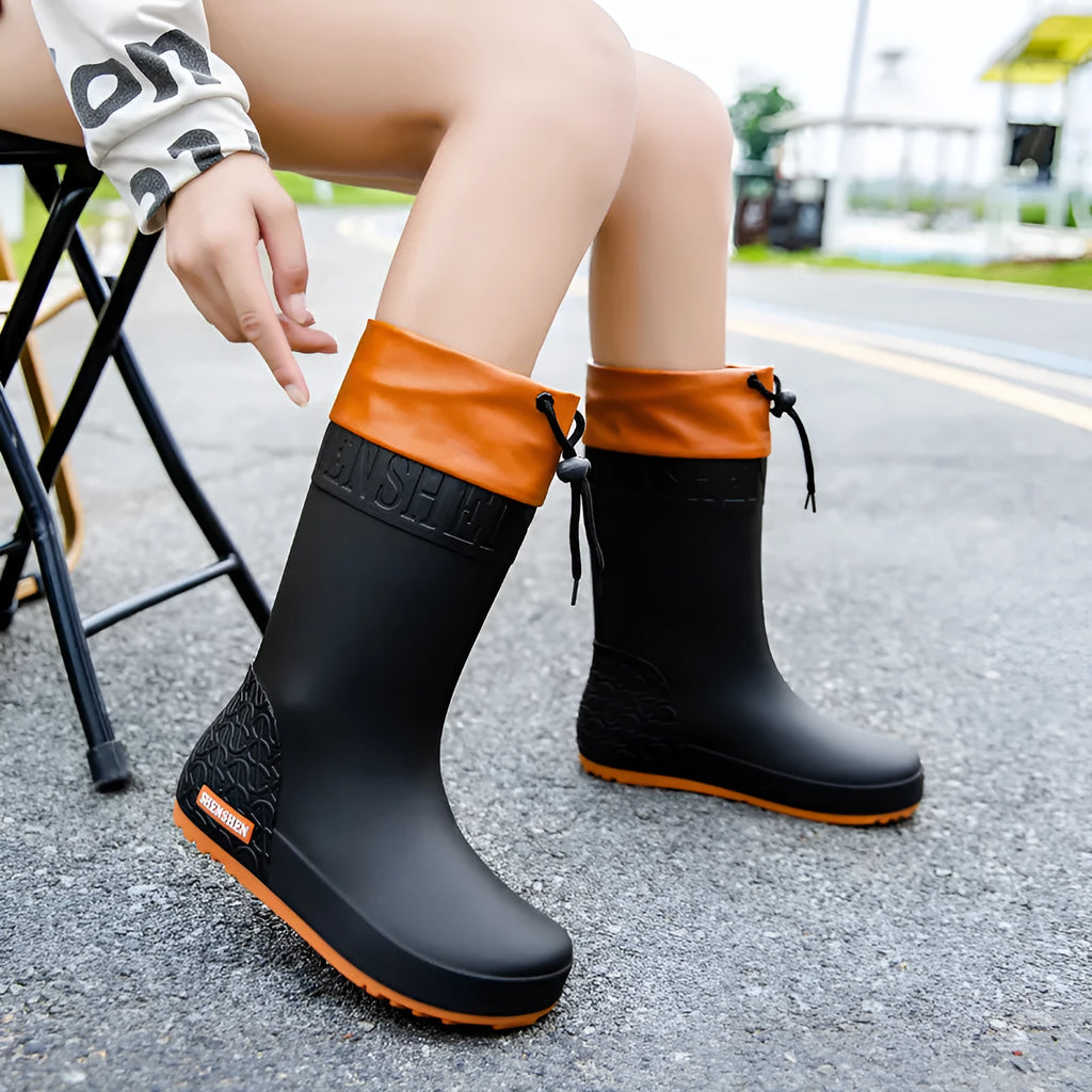 Women's PVC rain boots in non-slip wear-resistant design showing four colour options