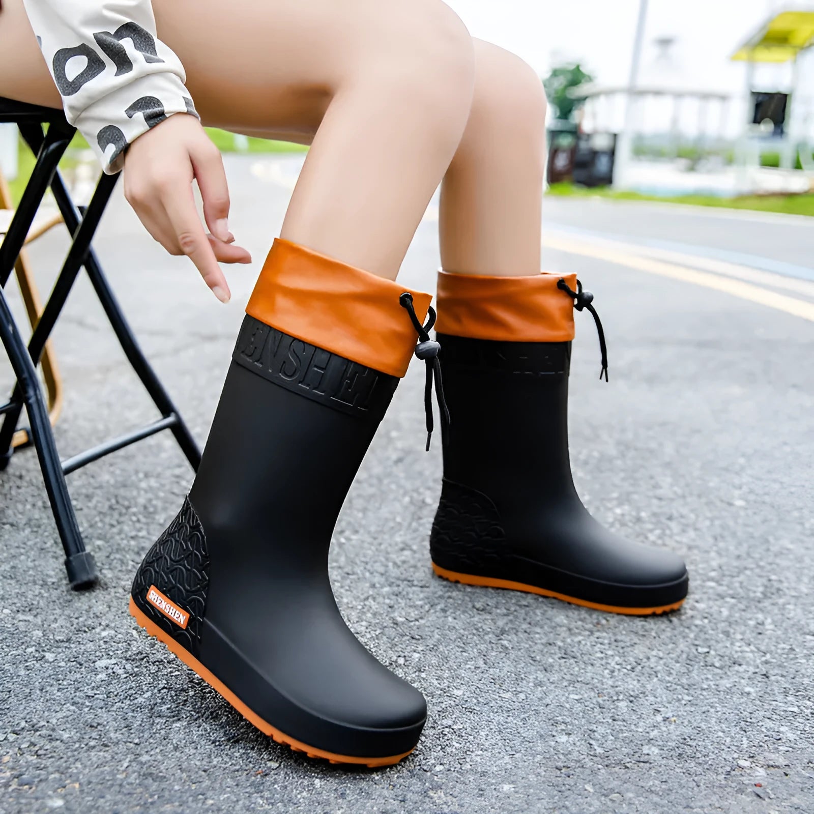 Women's PVC rain boots in non-slip wear-resistant design showing four colour options