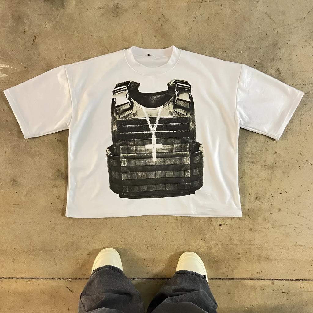 Man wearing a printed cotton short sleeve retro-style T-shirt with drop-shoulder sleeves.