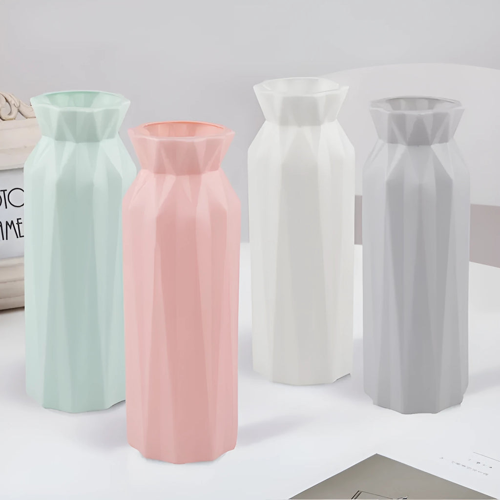 Green melamine plastic vase with a wide 7.2cm base on a wooden table.