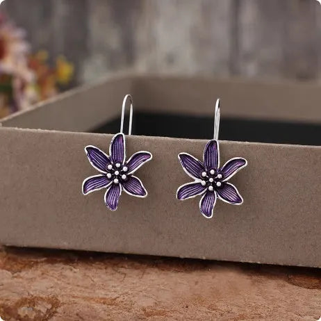 Purple flower-shaped earrings in lightweight alloy metal with electroplated finish