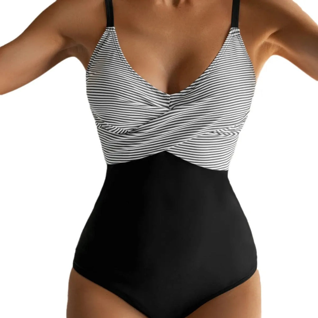 Women's printed backless one-piece bikini swimsuit with lace-up gathers, shown in a floral pattern.