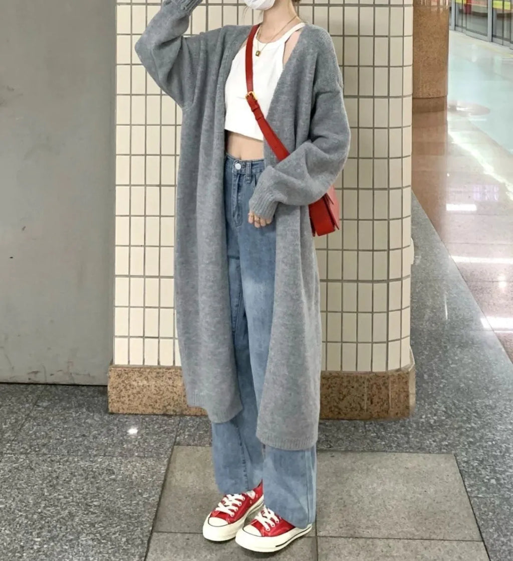 Loose large knitted women's cardigan in chenille fabric, shown in light grey colour
