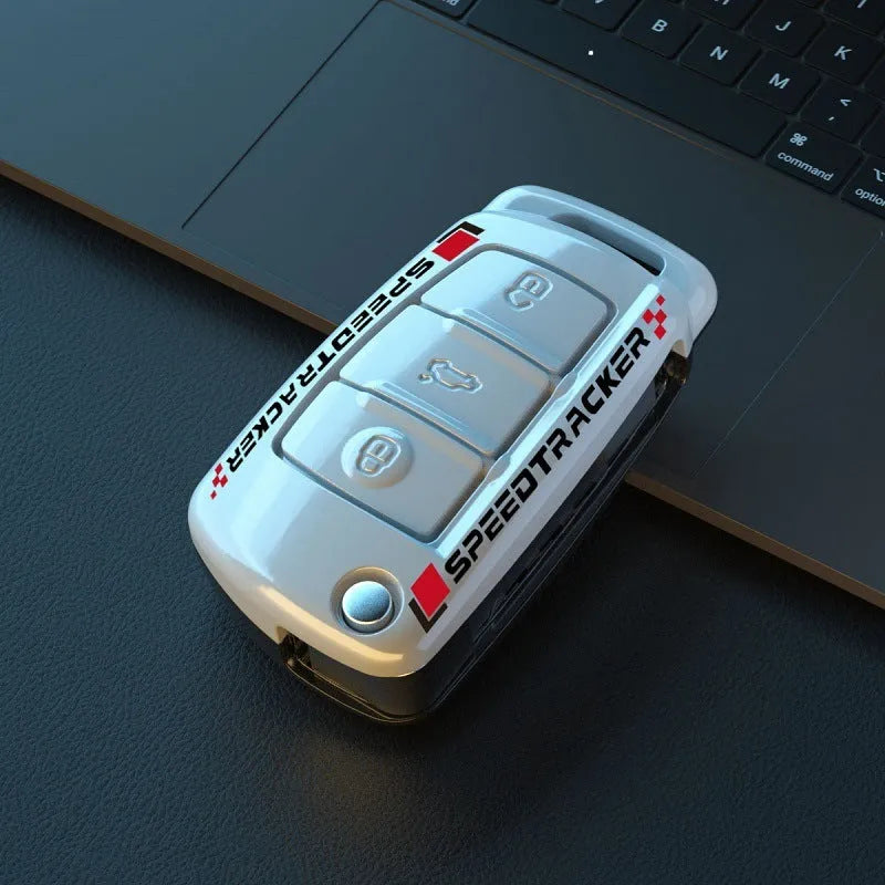 Carbon fibre style car key cover with mirror elements in carbon and white colour options
