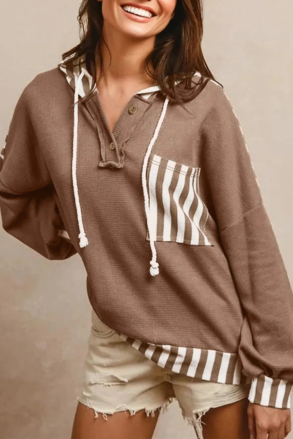 Straw yellow striped patchwork hoodie with waffle texture, button neck, and drawstring hood