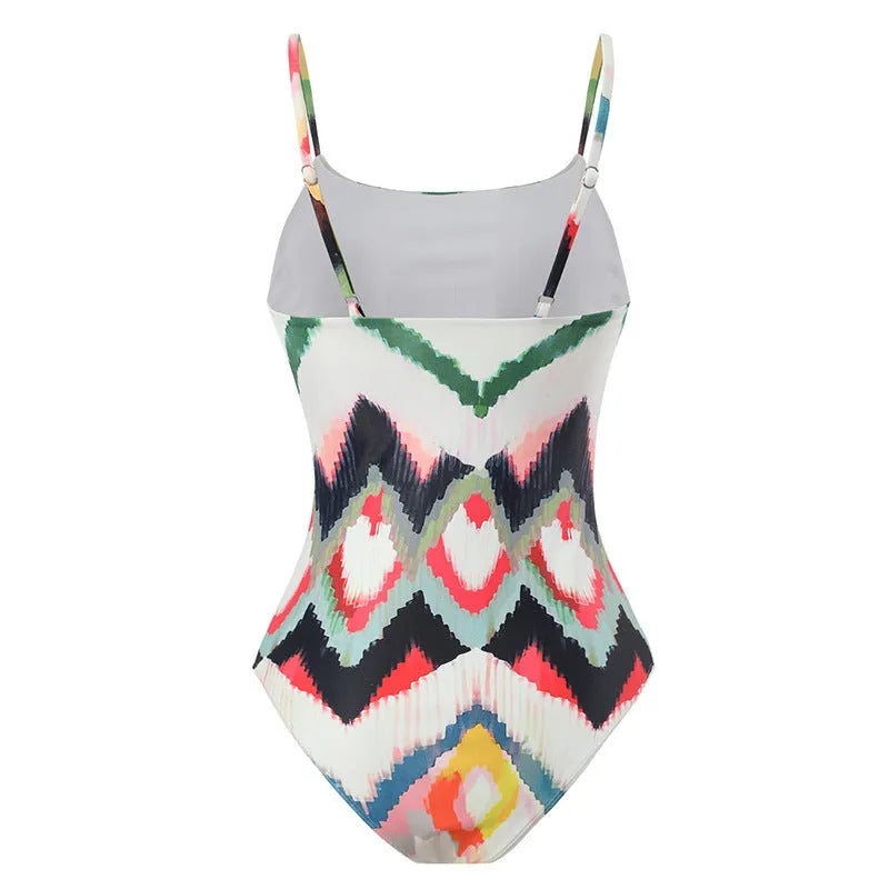 Women's two-piece swimsuit set with striped pattern and matching hip skirt