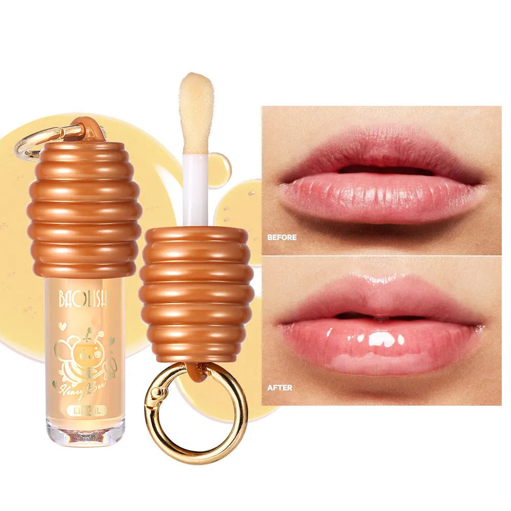 Honey lip gloss with keychain attachment for portable lip moisturising