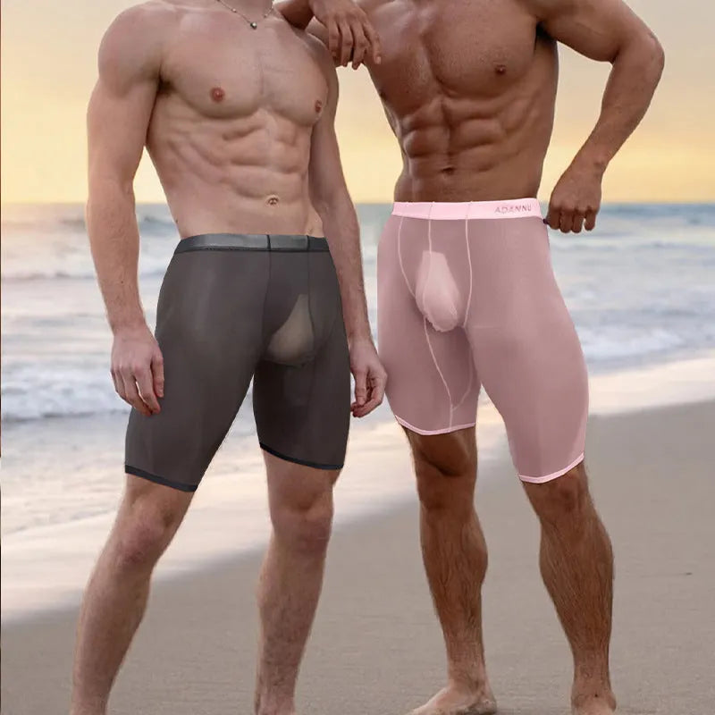 Men's solid colour mesh shorts with seamless construction and a hip-lifting fit, shown in black.