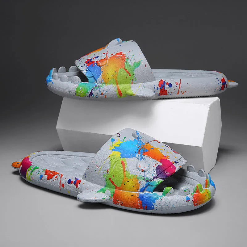 EVA open-toe shark-themed couple slippers in assorted colours on a white background.