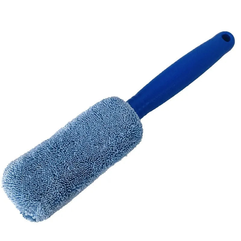 Blue long-handled microfiber brush for cleaning car tyres and wheels on a grey background.