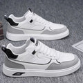 Men's low top canvas board shoes in beige with leather stitching detail and mesh lining
