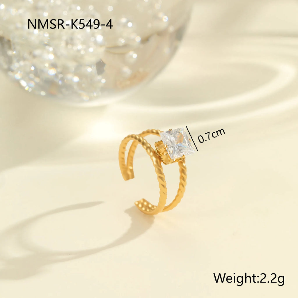 Gold inlaid zircon stainless steel open mouth ring with geometry design featuring heart and drop shapes
