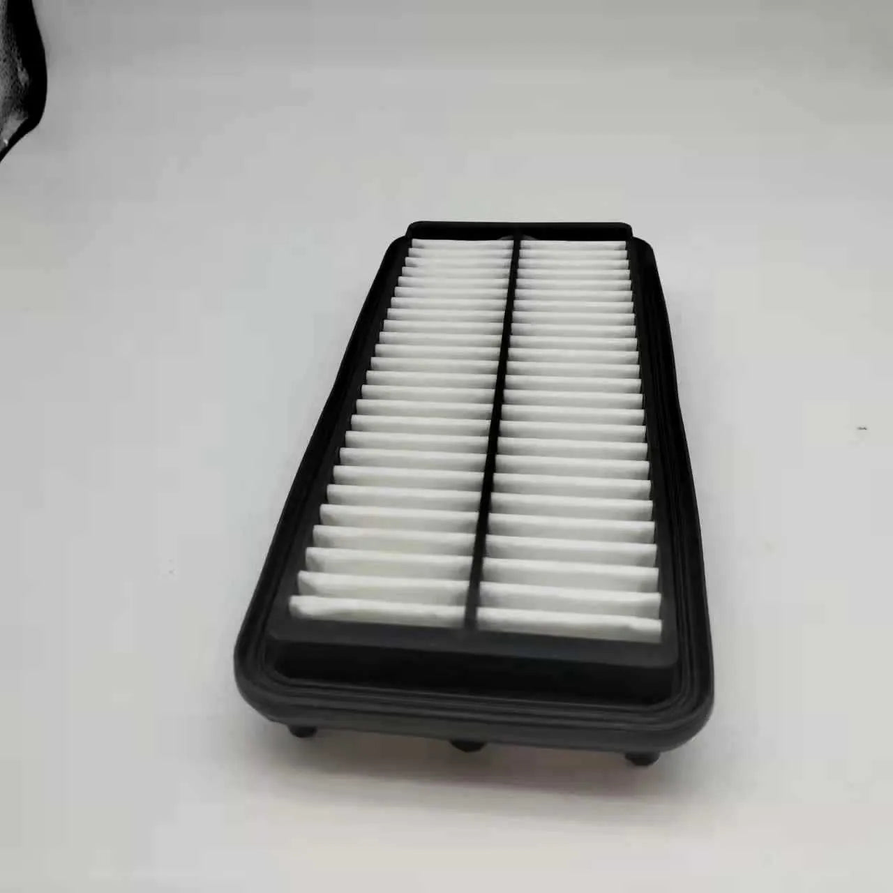 Black rectangular car engine air filter with dimensions 256mm by 113mm by 40mm.