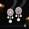Oval geometric earrings with zircon inlay and pearl tassels in four colour variations