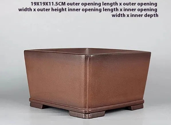 Handmade brown antique purple clay flower pot with classical style.