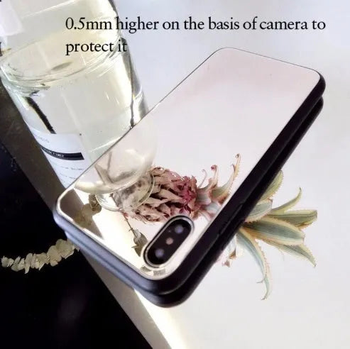 Black iPhone mirror phone case showing reflective back, compatible with iPhone X and 7/8 Plus models.
