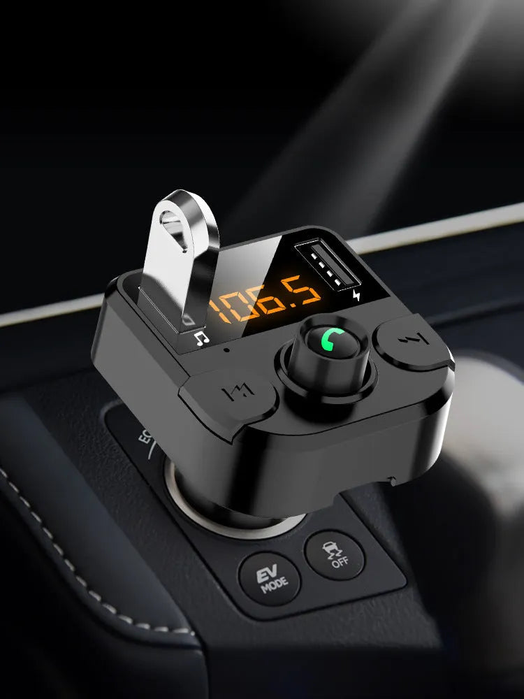 Black BT36B car MP3 Bluetooth player with display, plugged into a car cigarette lighter socket.