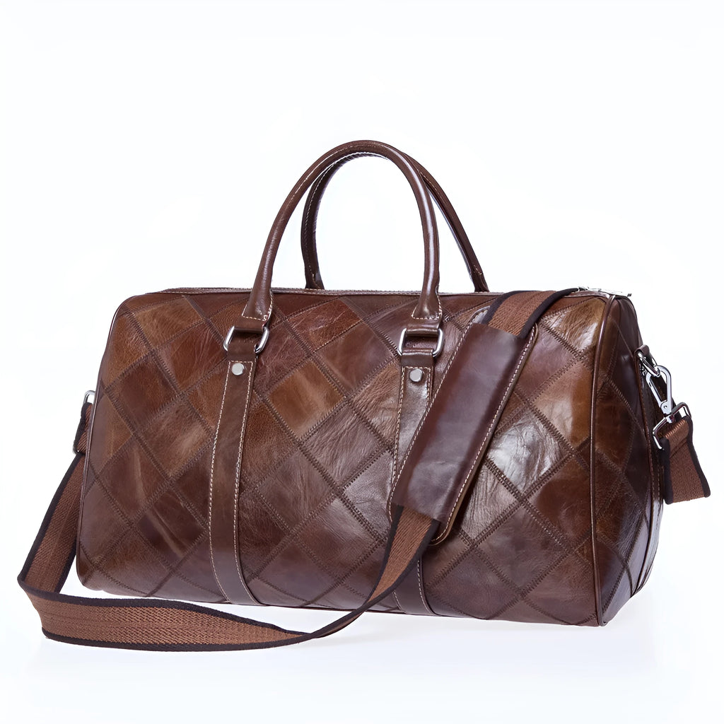 Vintage style brown leather men's duffel bag with a single shoulder strap.
