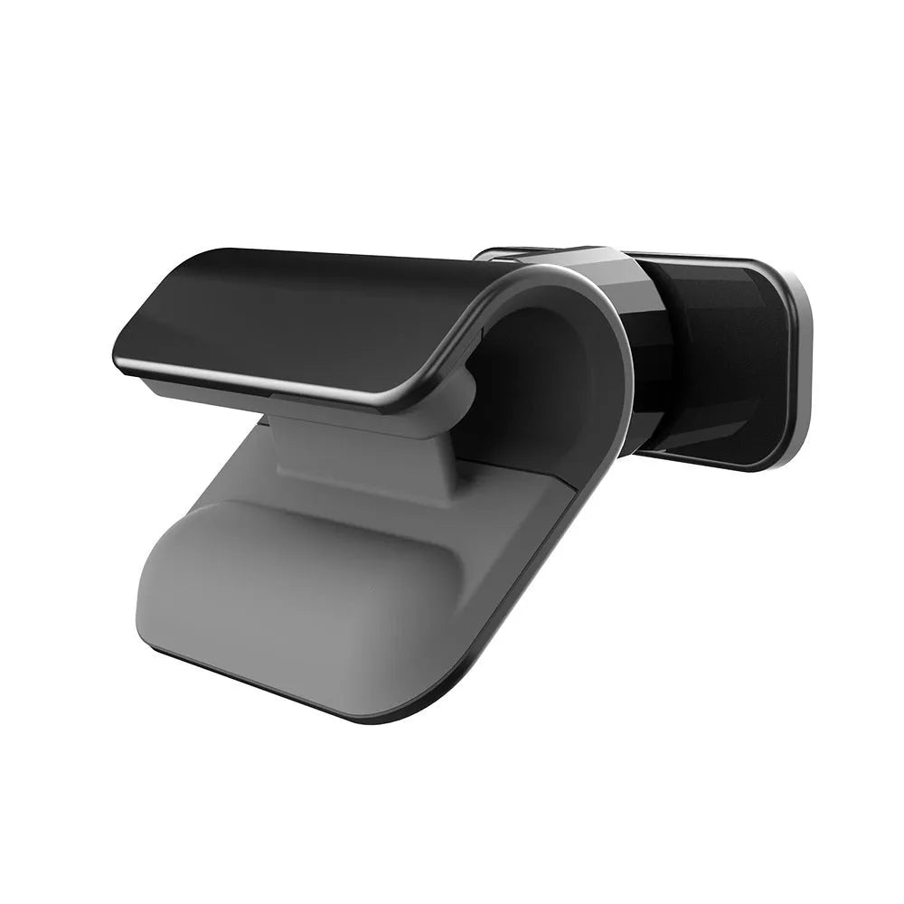Black car phone holder with 360-degree rotating mechanism mounted on dashboard