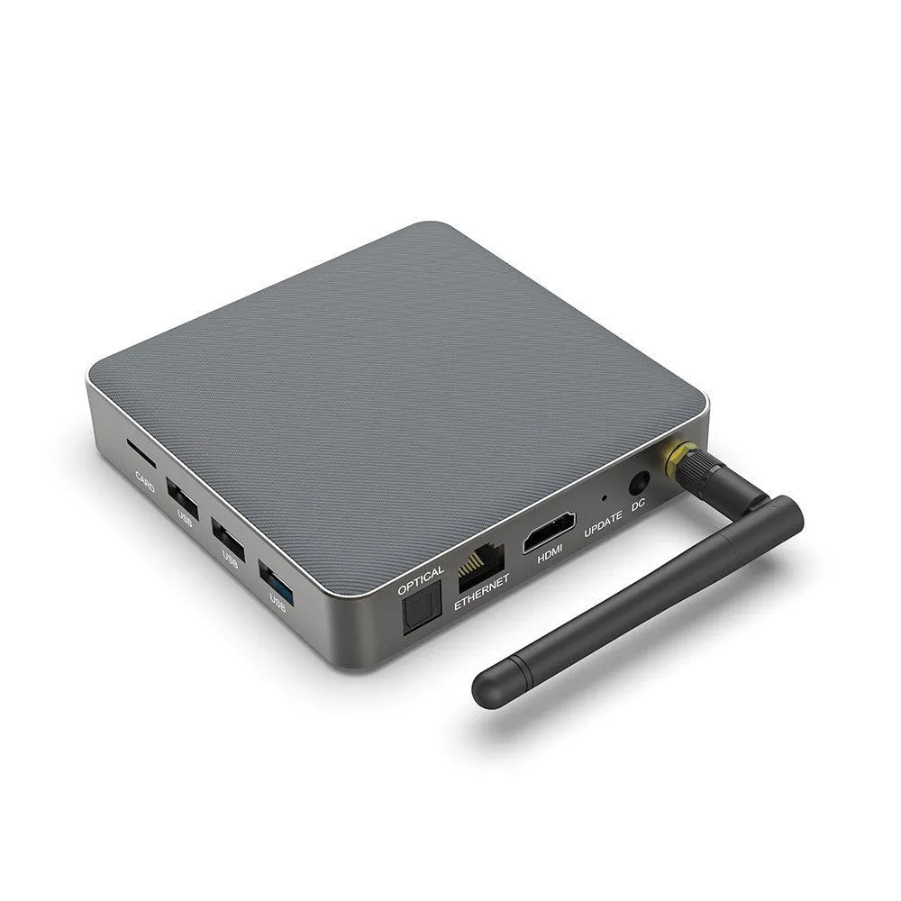 Black Android TV Box with remote, HDMI cable, and power adapter for 8K streaming.