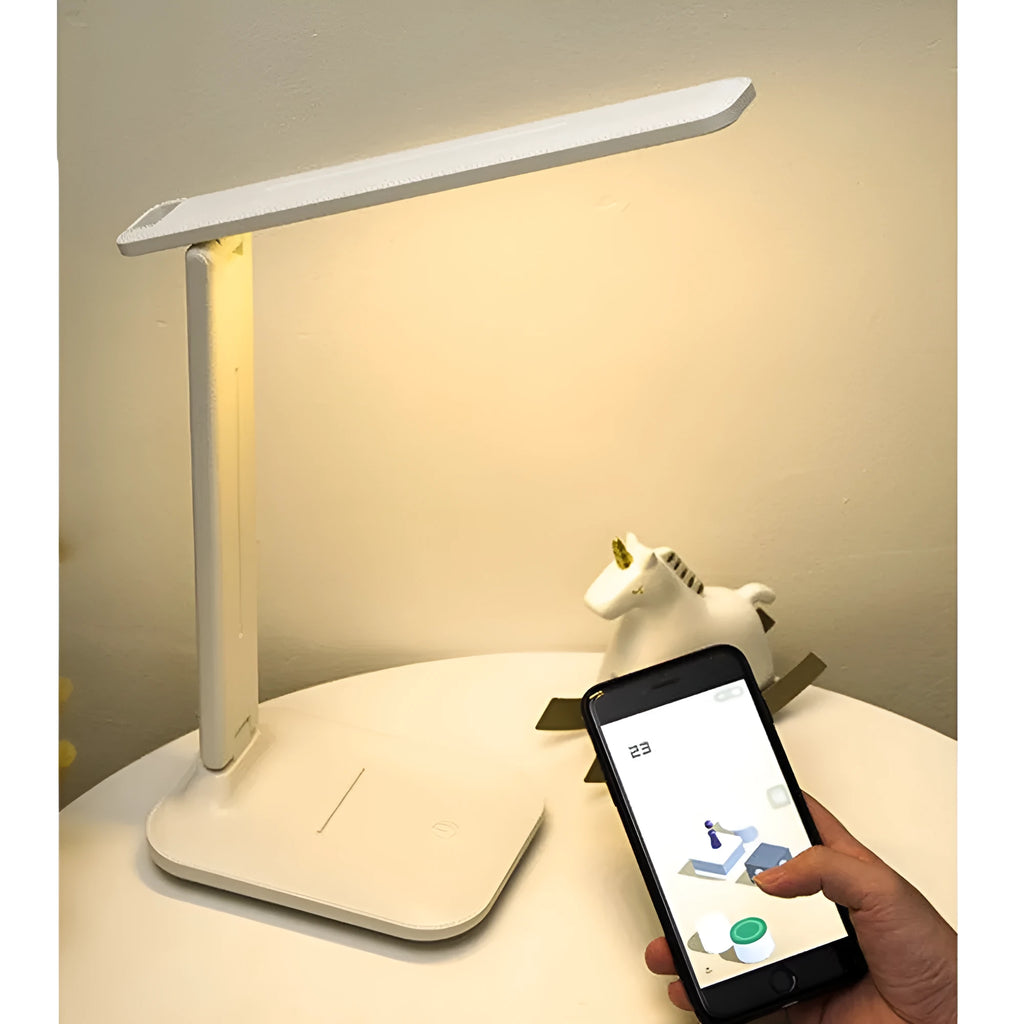 White plastic bedside lamp with touch dimming and colour-changing LED light for children's rooms