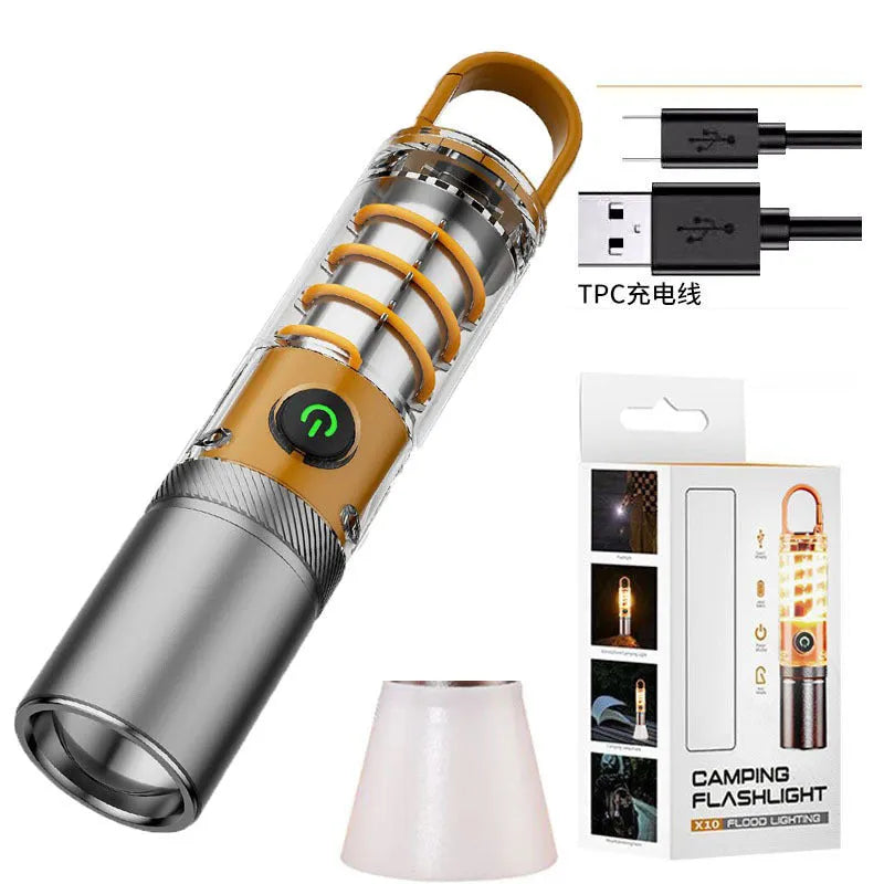 Orange and beige multifunctional flashlight with dual light source, hook attachment, and optical zoom feature