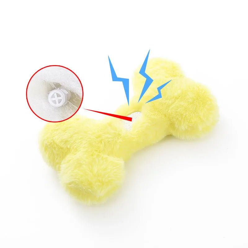 Blue love bone shaped plush dog toy with squeaker for biting and chewing.