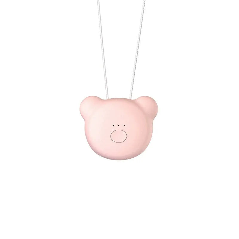 Mini USB portable air purifier necklace in blue, shown next to its charging cable.
