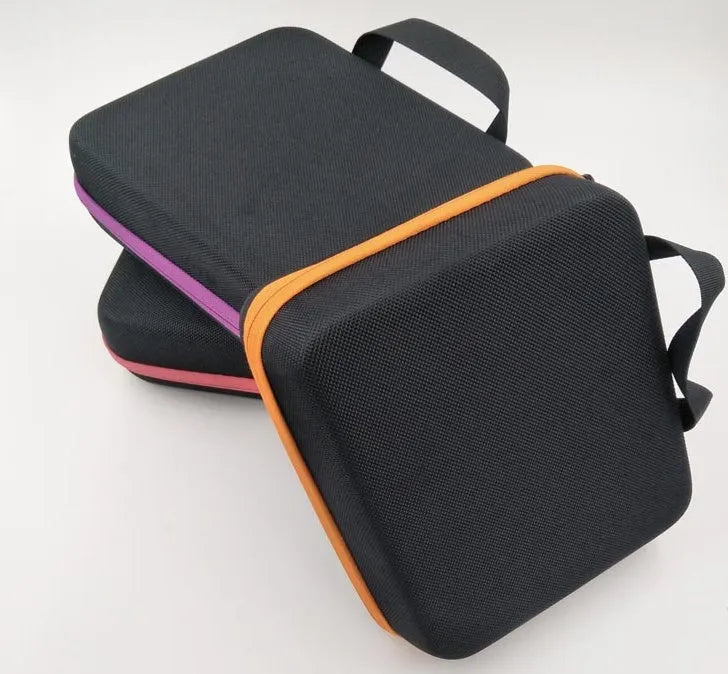 Red EVA essential oil storage bag with 30 compartments for 15ml bottles, shown with zipper open.