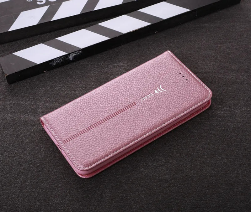 Black PU leather wallet-style case open to show card slots, next to an iPhone.