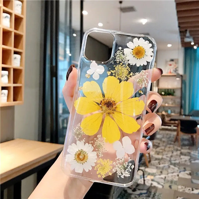 Floral TPU phone case with large pink and yellow flower designs for iPhone models