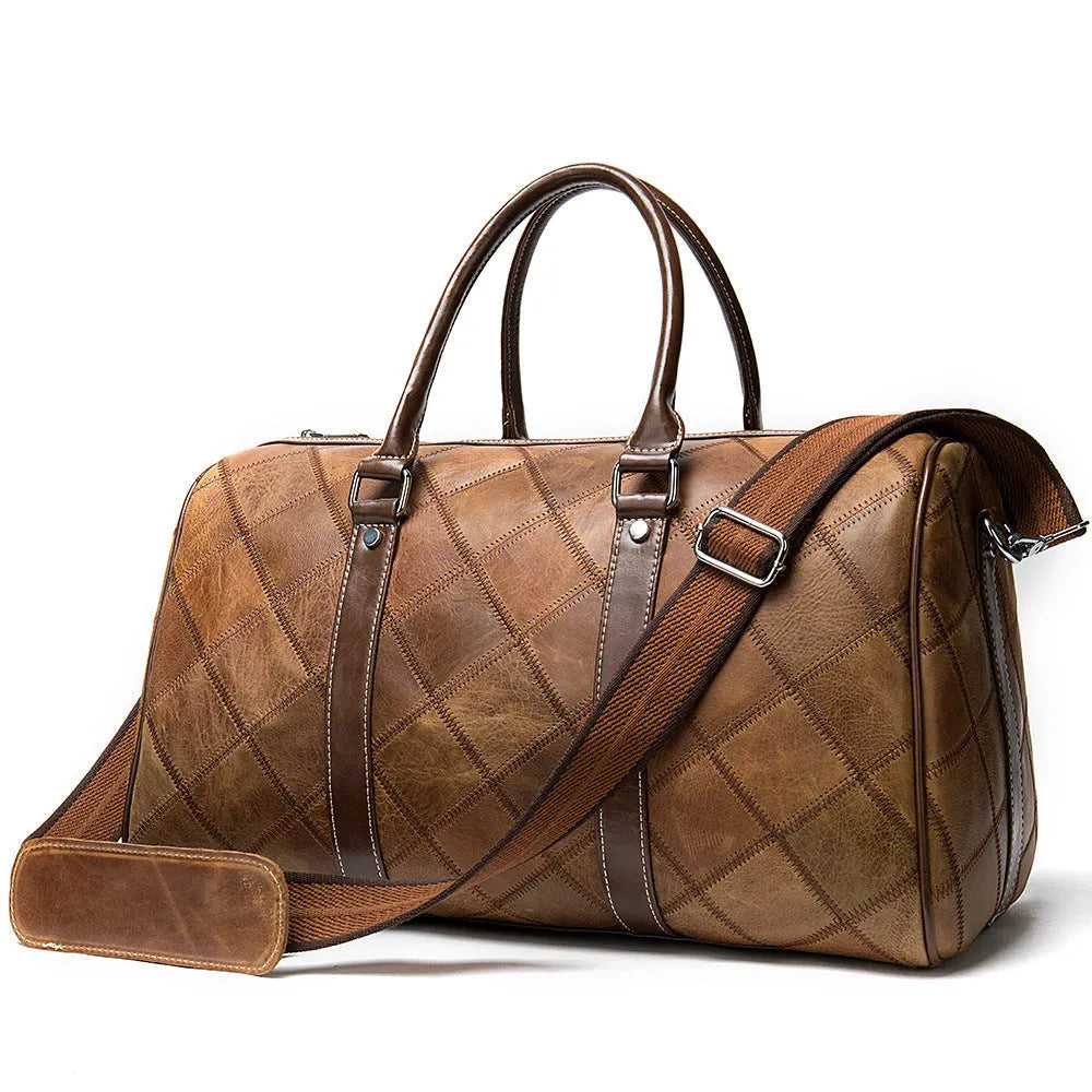 Vintage style brown leather men's duffel bag with a single shoulder strap.