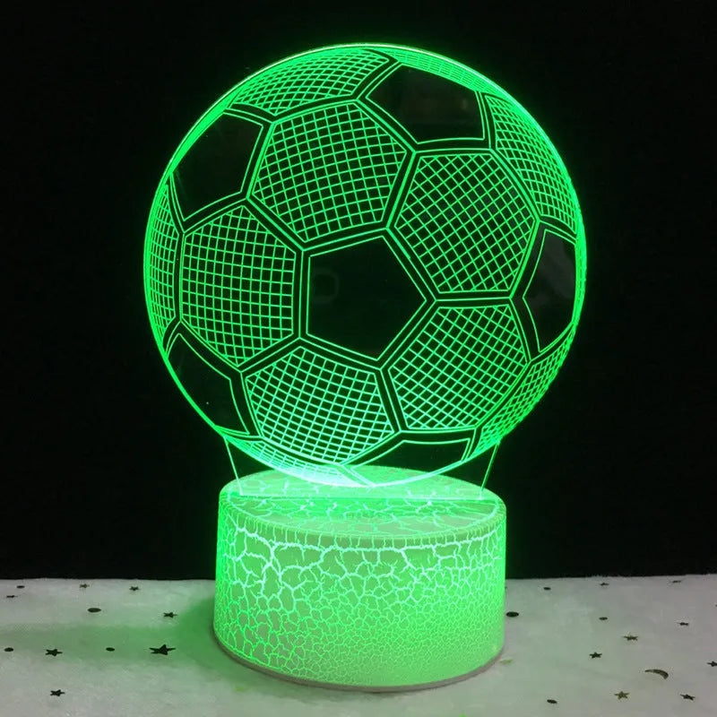 3D football shaped night light with colourful LED illumination on a black ABS base.