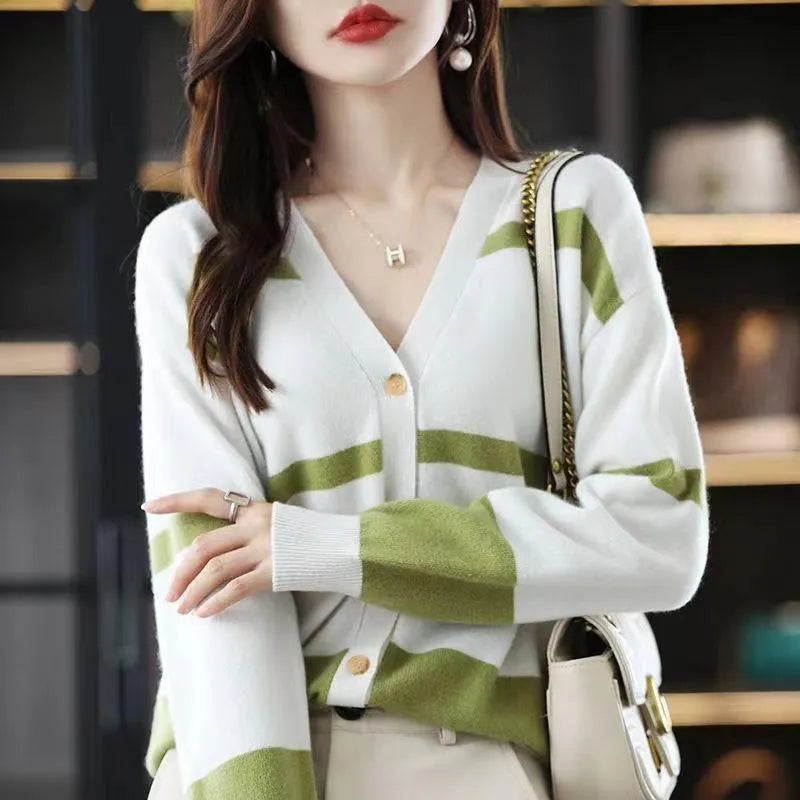 Women's slim fit striped cardigan with 3D pattern texture, V-neck, and button front closure.