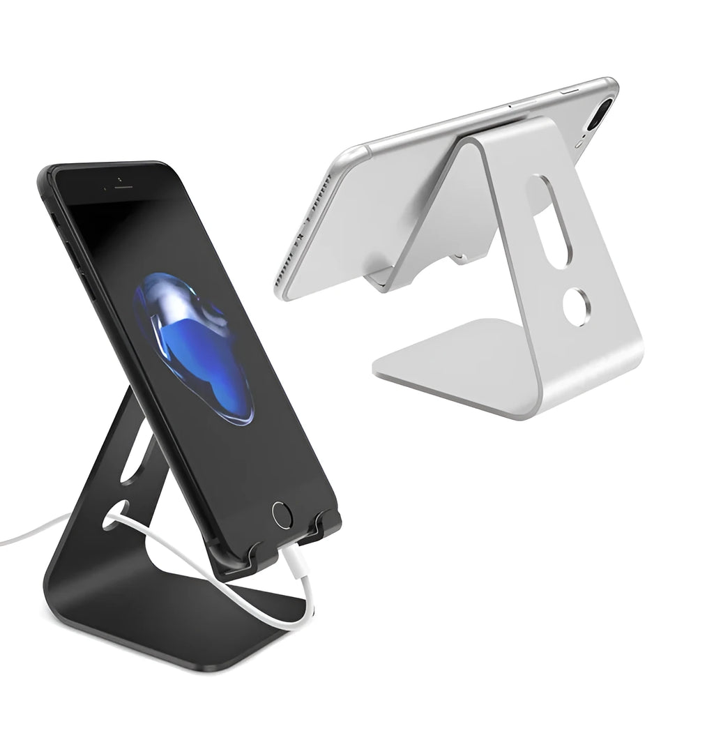 Aluminium alloy universal phone and tablet stand in silver colour on a wooden desk.