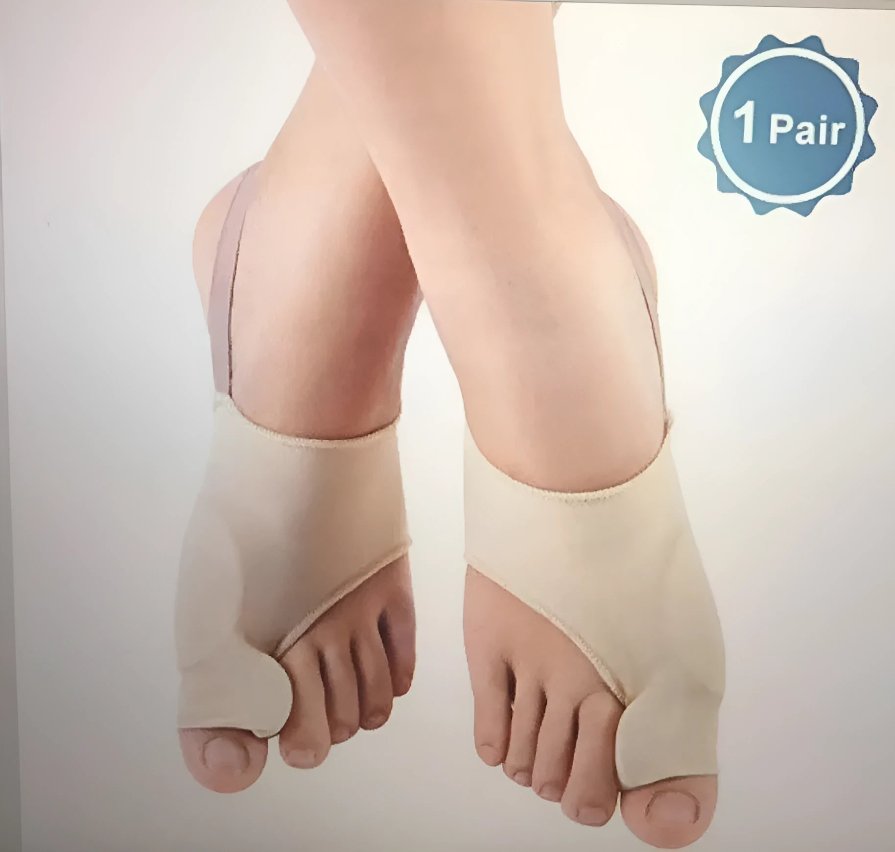 Pair of beige corrective toe socks with a clear silicone gel bunion pad and toe separator.