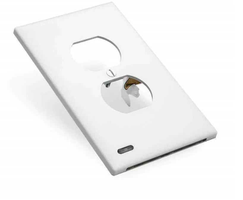 White plug-in LED sensor night light installed in a wall socket