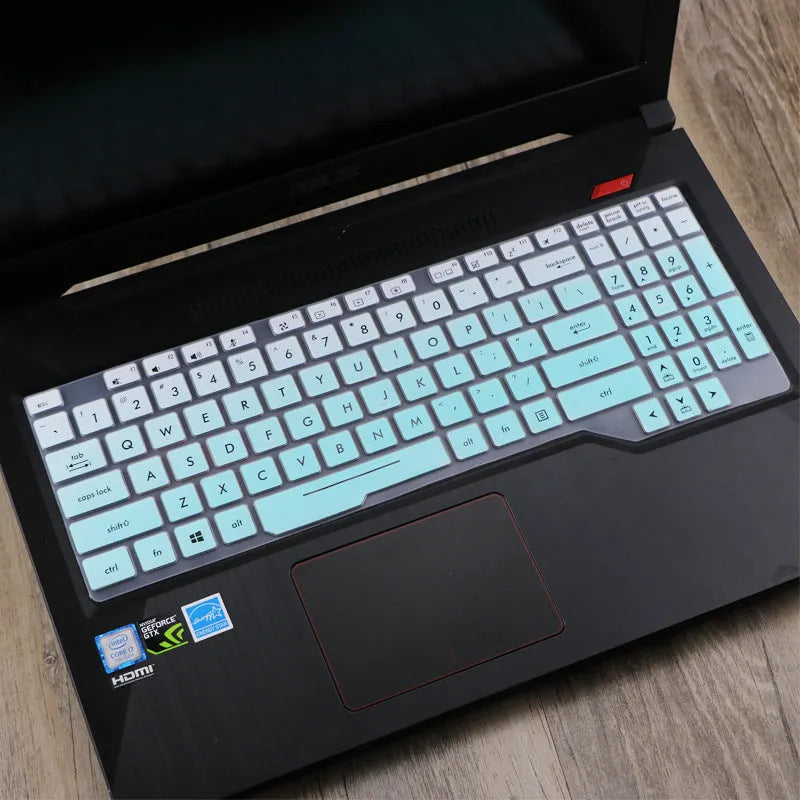 ASUS Flight laptop keyboard protective film cover shown in a translucent colour option on a laptop.