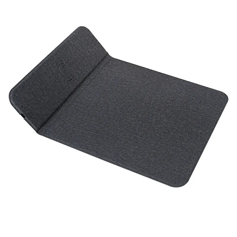 Foldable cloth phone holder with wireless charging pad showing fabric surface and compact folded design
