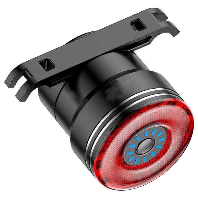 Black USB rechargeable smart brake sensing bicycle taillight with aluminium housing showing multiple LED modes