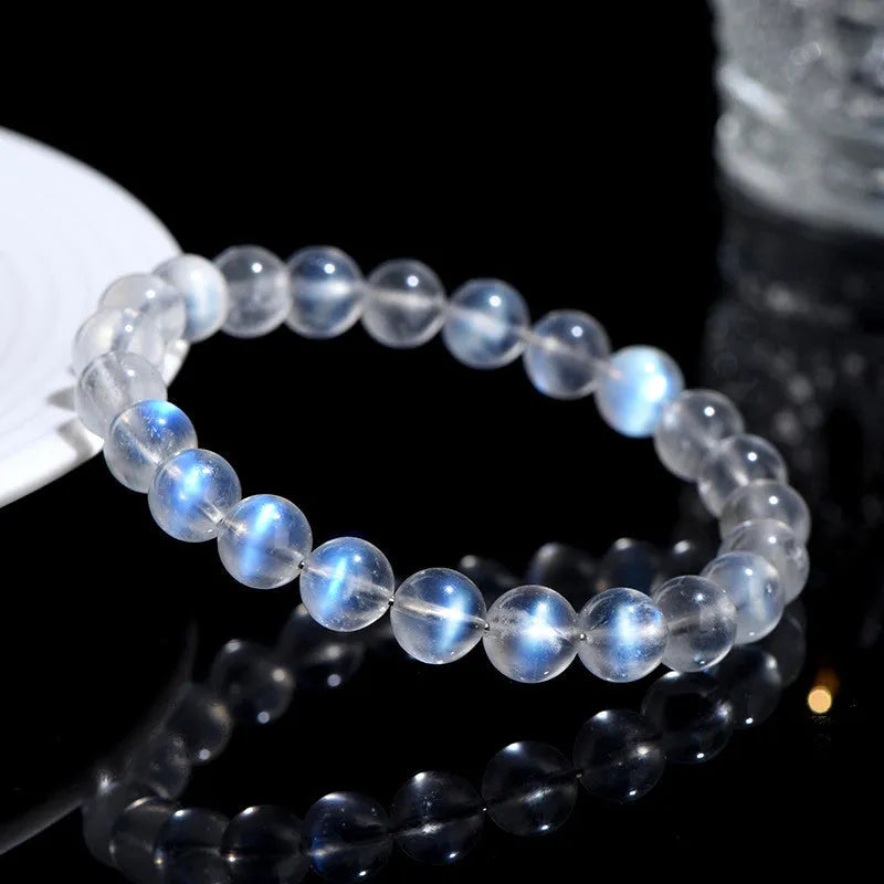 Natural cream body blue moonlight crystal bracelet with grinding treatment showing multiple size options