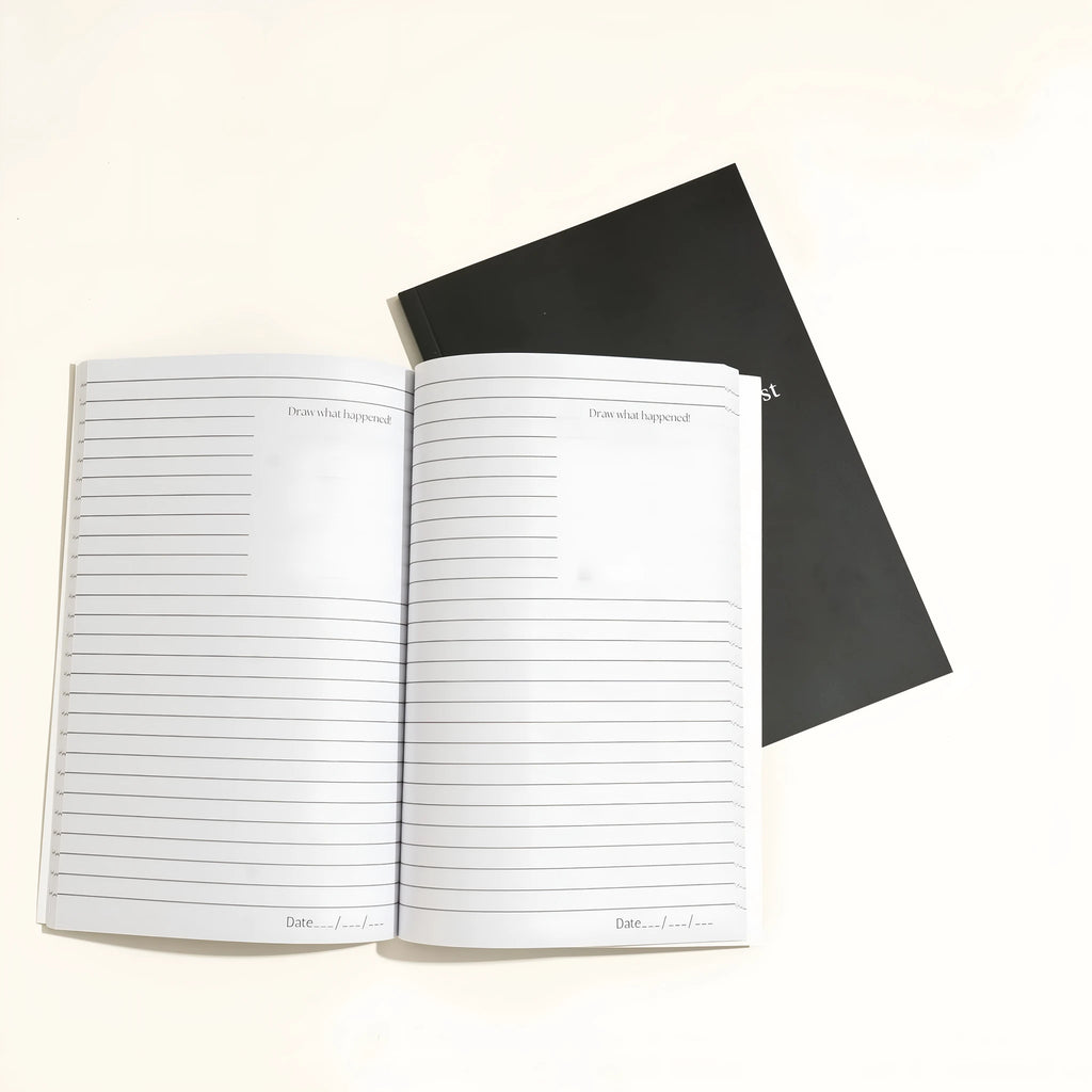Black leather A5 dream journal notebook with embossed cover and lined pages