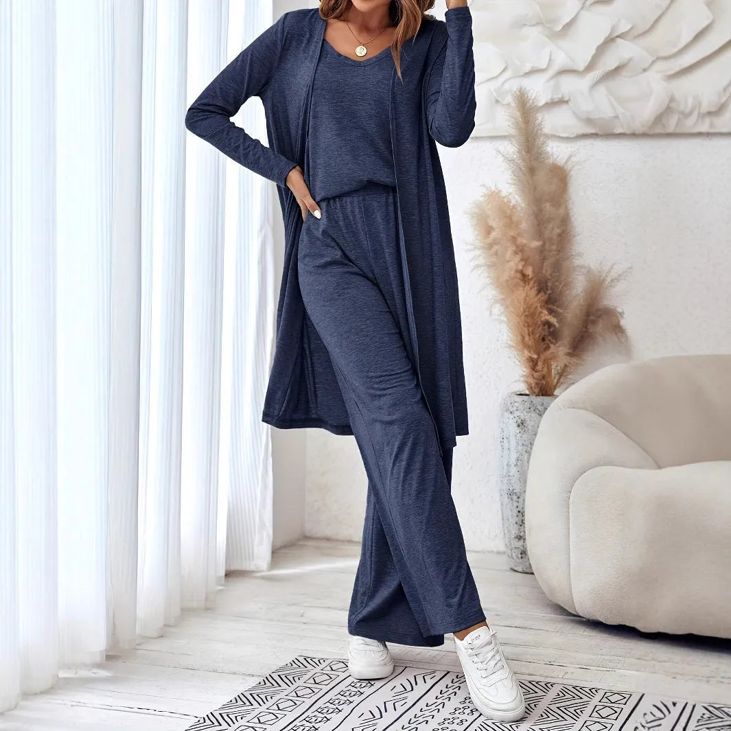 Blue women's three-piece suit with sling top, cardigan trousers and detachable suspenders