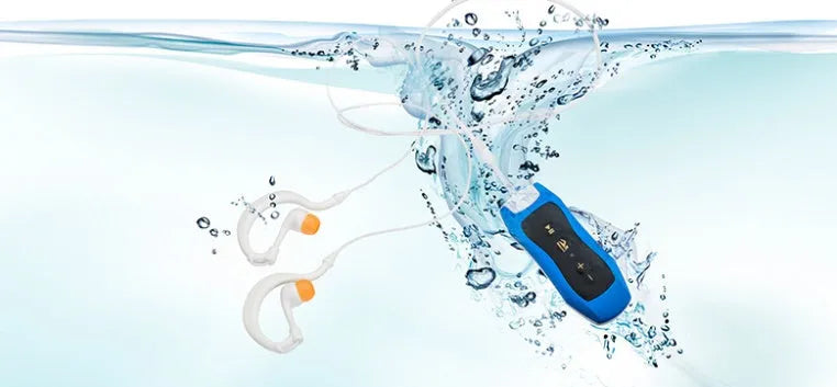 IPX68 waterproof Bluetooth mini headset MP3 player in multiple colours on a white background.