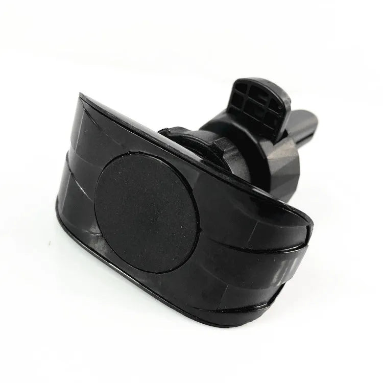Black car phone holder attached to vehicle air vent holding smartphone