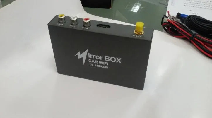 Black car mirror link box with Wi-Fi connectivity for smartphone screen mirroring to car audio systems