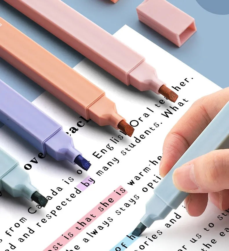 Double-headed fluorescent marking pens showing two different ink colours per pen